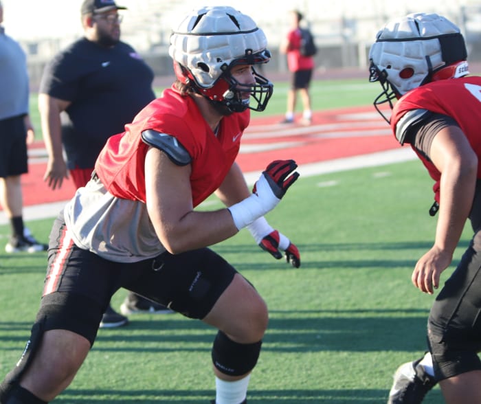 Wade Helton battles offensive player.